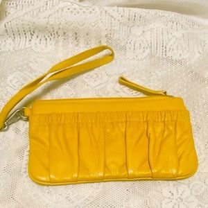 New York Toronto genuine leather yellow clutch/ wristlet .